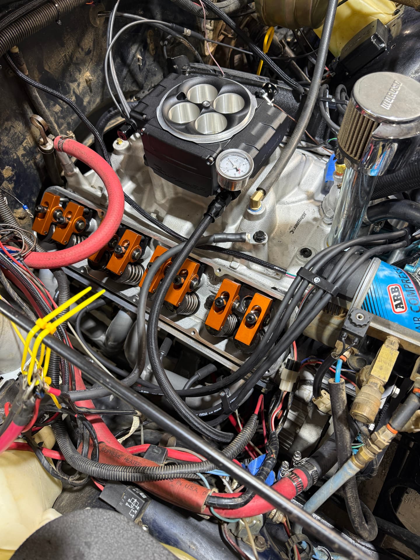 Engine-system diagnostics and repair work in an EFJ engine bay.