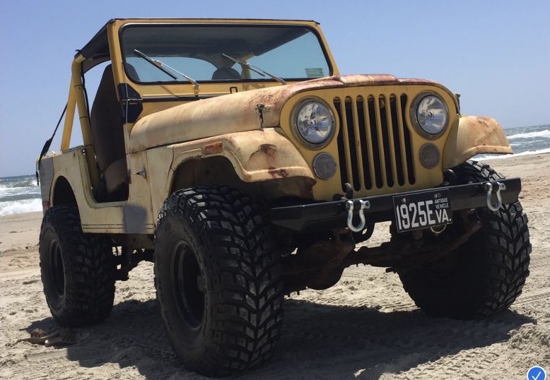 Mellow Yellow, Eli's vintage tan 1977 CJ7, on the beach